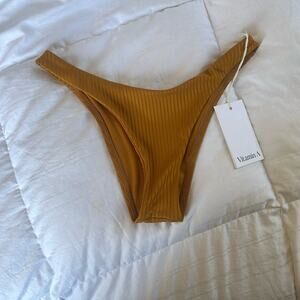 NWT Vitamin A Brazilian cut bikini bottoms.  Size M